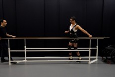 This handout photo released on October 31, 2018 by the Federal Polytechnique School of Lausanne (EPFL)/ The Lausanne University Hospital (CHUV) shows David Mzee, who suffered full paralysis of his left leg after an accident in 2010, at the Lausanne University Hospital in Spring 2018. 