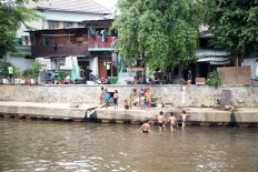 Jakarta: 'Normalisasi' and 'naturalisasi'