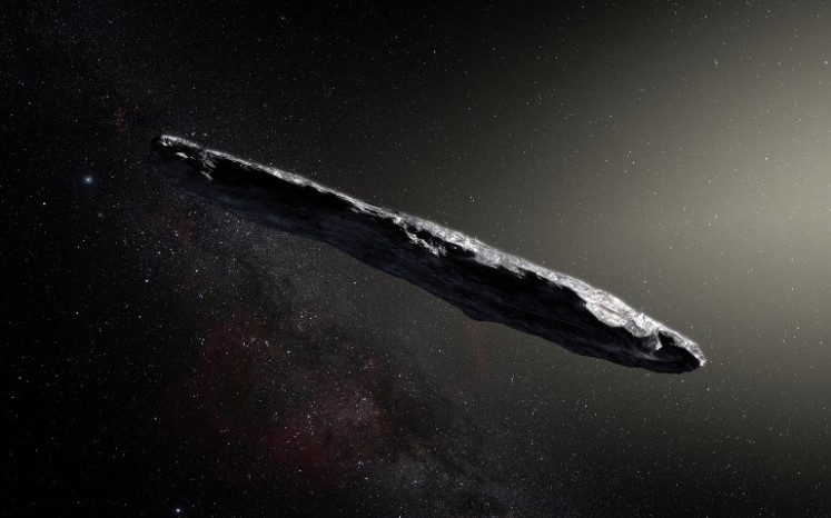 This handout image of artist's impression released by the European Southern Observatory on November 20, 2017 shows the first interstellar asteroid: Oumuamua. 