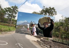 Missing home: Evacuees return home several weeks after the 2010 Mount Merapi eruption destroyed their village in Balerante, Klaten, Central Java. JP/Boy T Harjanto