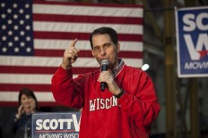 Wisconsin governor, bane of labor, loses re-election