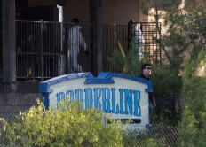 Marine combat veteran kills 12 in crowded California bar