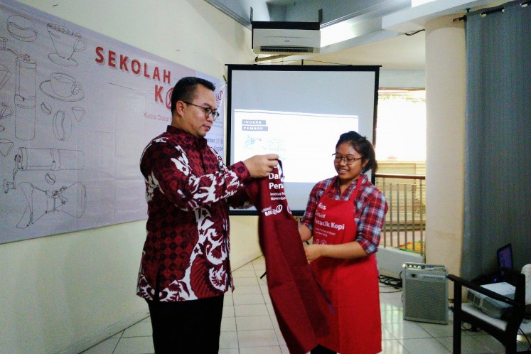 Yessica Cahyani Sitohang, a student of IPB's Sekolah Kopi. (JP/Theresia Sufa)