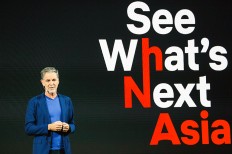 Conquering the east: Reed Hastings delivers his opening remarks at Netflix’s “See What’s Next: Asia” event at the Marina Bay Sands Hotel in Singapore in 2018. 