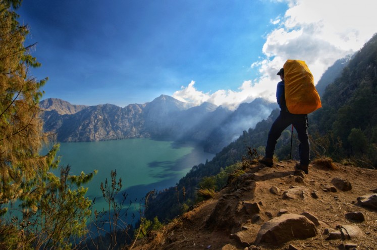 Vast beauty: A hiker is seen on his journey to hike Mount Rinjani from Senaru route. 