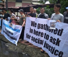 Refugees from Afghanistan stage a rally in front of the United Nations High Commissioner for Refugees’ (UNHCR) office in Medan, North Sumatra, on Monday, Nov. 19, 2018.