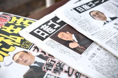 Prosecutors focus on Ghosn memos about deferred pay