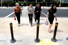 New Jakarta sidewalks friendly for high heels, not wheelchairs