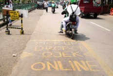 Base fare for app-based ‘ojek’ decided at Rp 10,000