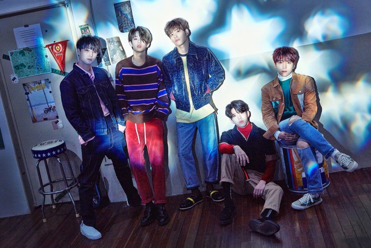 Laid back: Korean pop-rock band Day6 pose together in an undated promotional photo.