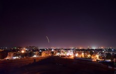 Syrian air defence batteries responding to what the Syrian state media said were Israeli missiles targeting Damascus international airport. An Israeli missile attack targeted the Syrian capital's airport today, activating air defences which shot down a number of the projectiles, state news agency SANA reported on Sept. 15, 2018.
Handout / SANA / AFP