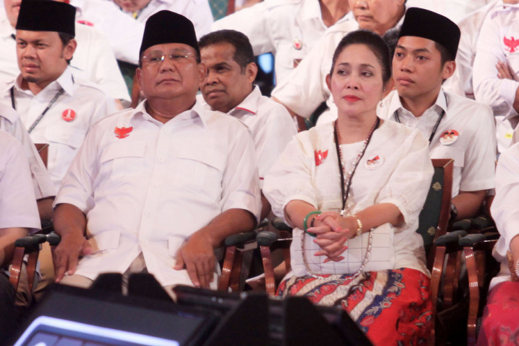Presidential candidate Prabowo Subianto (second left) sits beside former wife Titiek Soeharto during an election debate event in Jakarta on June 29, 2014. 