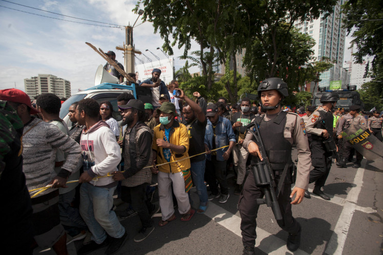 The East Java Police and Surabaya Police deployed 1,055 police officers, aided by two Army groups and the Surabaya Public Order Agency (Satpol PP), to disperse a clash between members of the Papuan Students Alliance and other groups that accused them of committing treason.