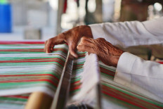 Fashioning a better future for Indonesian weavers