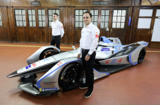 Eco-friendly racers: Venturi Formula E drivers Felipe Massa (front) and Edoardo Mortara (back) pose during the presentation of the Venturi electric Formula E car for the 2018-2019 season in Monaco on Nov. 30, 2018. 