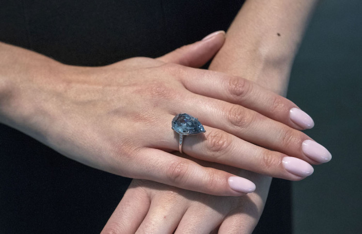 A 10.62-Carat Fancy Vivid Blue Diamond Ring, estimated to sell for $20/30 Million, is displayed at Sotheby's Nov. 30 in New York. The ring is part of the Lady Blue Eyes: Property of Barbara and Frank Sinatra auction going on Nov. 27-Dec. 7