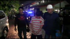 Man arrested for distributing drugs for prison inmate