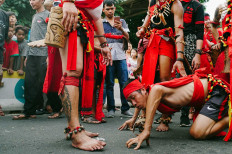 Indonesians of Chinese descent from the Dayak tribe, Kalimantan, join the parade. JP/Donny Fernando