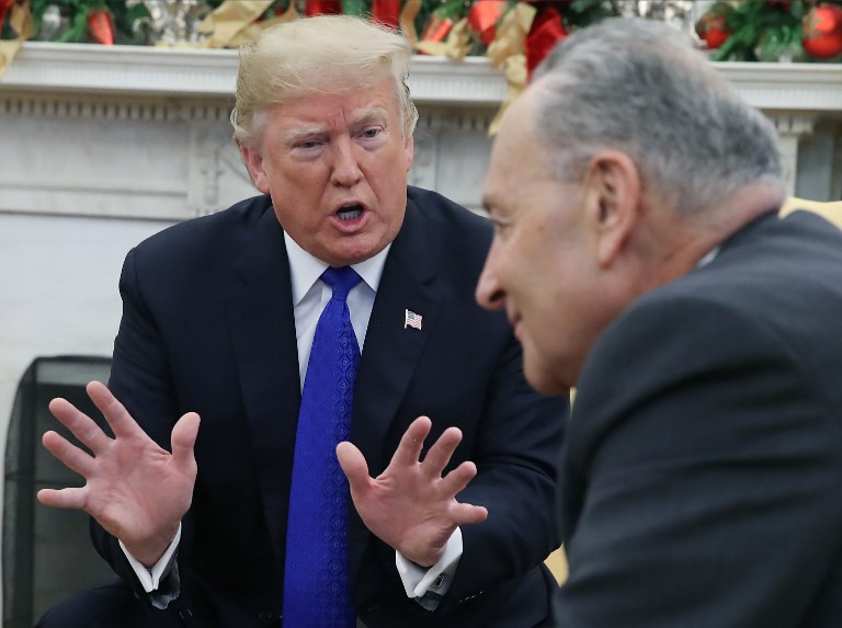 U.S. President Donald Trump argues about border security with Senate Minority Leader Chuck Schumer (D-NY) in the Oval Office on December 11, 2018 in Washington, DC. 