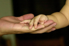 Landmark High Court case allows Singaporean gay dad to adopt surrogate son