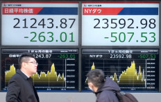 Asian stocks dip as investors curb vaccine enthusiasm