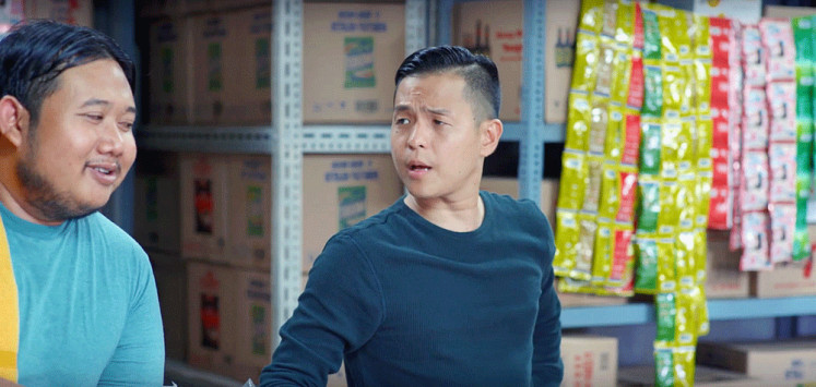 Difficult employee: Stand-up comedian Yusril Fahriza (left) plays Naryo, a feminine, vaguely homosexual shop employee who refuses to do a task under the pretense of letting his clear nail polish dry.