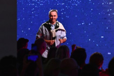 Prada brings in star designer Raf Simons to shake up look