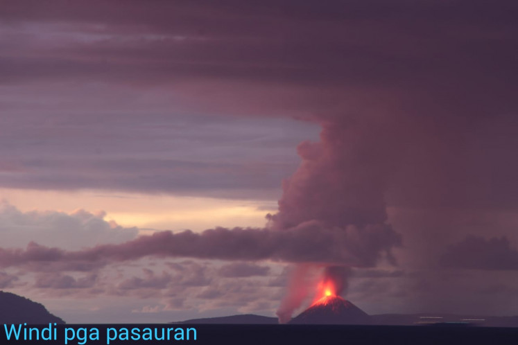 A photo of Mount Anak Krakatau erupting taken from a monitoring station in Pasauran, Anyer Beach, on Saturday evening, December, 22, 2018.