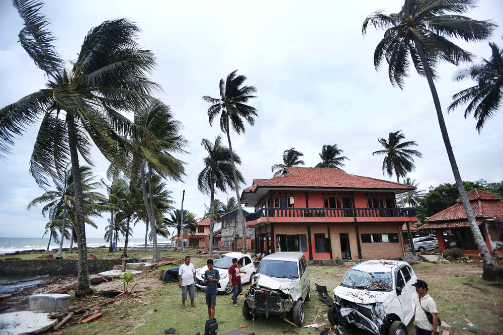 Rise again Tsunami survivors open shop hotels amid rubble