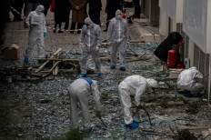 Police officer injured in blast outside Athens church