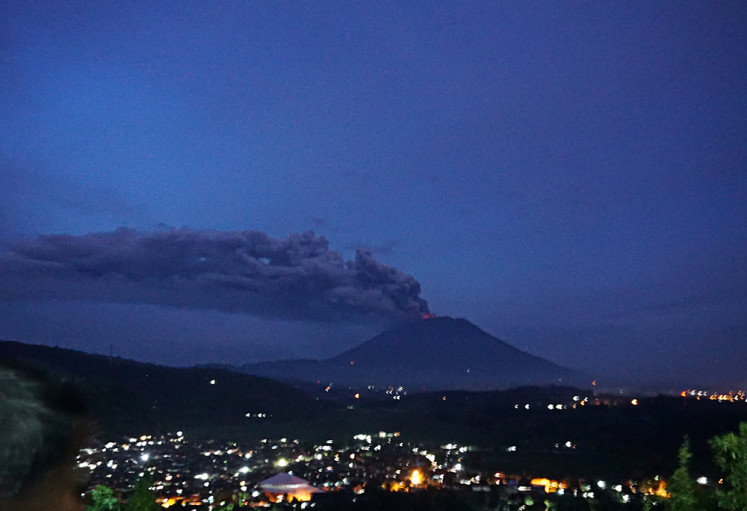 Mother nature: Thick smoke is seen emanating from the crater of Mount Agung in Karangasem regency, Bali, during its eruption in 2017.