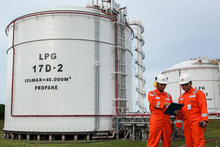 Workers at the Badak liquefied natural gas plant in Bontang, East Kalimantan.