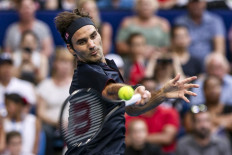 Federer beat Tiafoe and looks forward to playing Serena