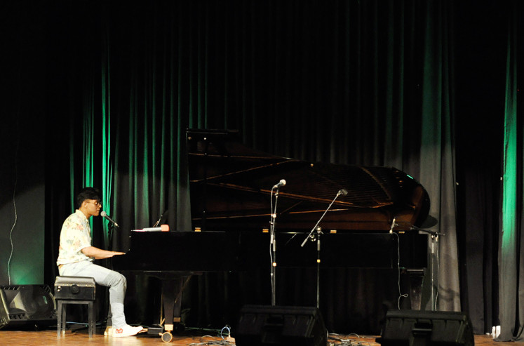 Keys to success: Singer Ardhito Pramono plays the piano during his performance at Erasmus Huis in Jakarta.