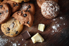 Chocolate chip cookies on cutting board