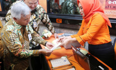 Customers can top up Mandiri e-money at Pos Indonesia outlets