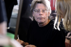 American author Stephen King looks on on November 13, 2013 in Paris, during a book signing event dedicated to the release of his new book 'Doctor Sleep', the sequel to his 1977 novel 'The Shining'. 