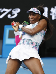 Veteran Venus battles back to reach Open second round