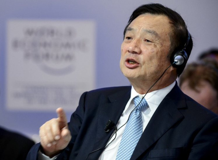 Huawei Founder and CEO Ren Zhengfei speaks during a session of the World Economic Forum (WEF) annual meeting on January 22, 2015 in Davos. 