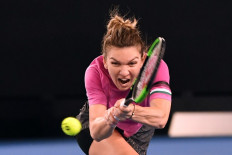 Top seed Halep cools Open expectations after early scare