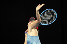 Sharapova upsets defending champion Wozniacki
