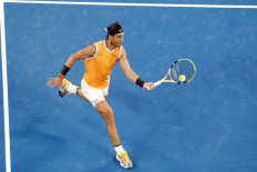 Ruthless Nadal romps past De Minaur at Open