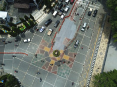 Surakarta to cover cross-shaped road mosaic with paint after complaints from Muslim groups 