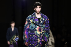 Dowdy no more: Men in suits storm back into style  