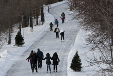 Ice skaters follow a trail during La fête des Neiges, Montréal’s great winter festival, where families are invited to play outdoors and enjoy an array of activities at the Parc Jean-Drapeau January 22, 2011 in Montreal, Quebec, Canada.