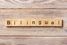 The study published in the latest version of the open-access journal said that no evidence showed bilingual children were better than monolingual ones in remembering instructions, controlling responses and shifting swiftly between tasks.