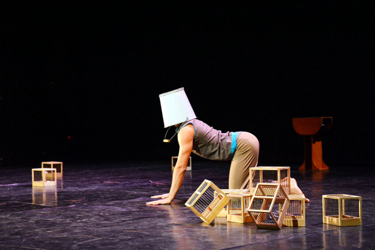 Bucket-head: The Flying Cow dance performance on Jan. 12 presents absurd yet amusing moments that are met with rapturous laughter from the audience. 