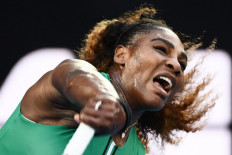 Serena muscles past top seed Halep into Open quarters