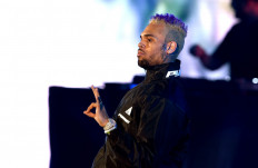 Rapper Chris Brown skips Paris hearing over rape accusation
