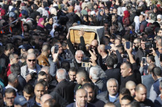 Thousands at funeral of Arab Israeli killed in Australia
